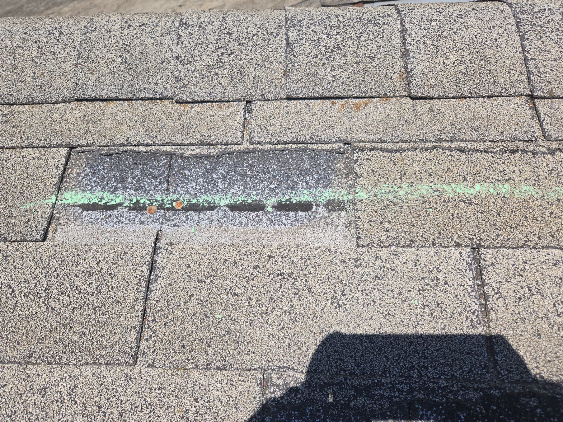 Close up photo documentation of damaged roofing material